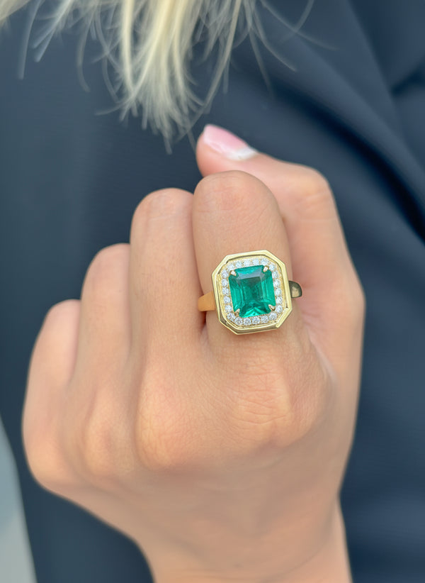 Emerald Octagon With Diamond Ring
