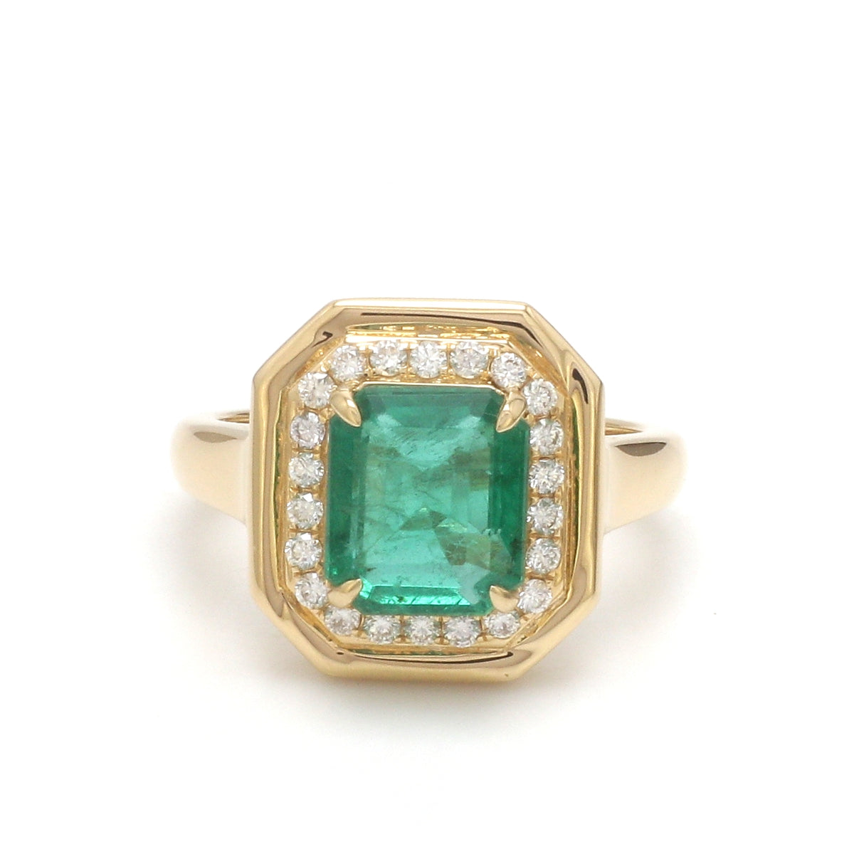 Emerald Octagon With Diamond Ring
