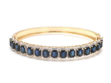 Blue Sapphire and Diamond Bangle in Gold – Elegant Statement Bracelet
